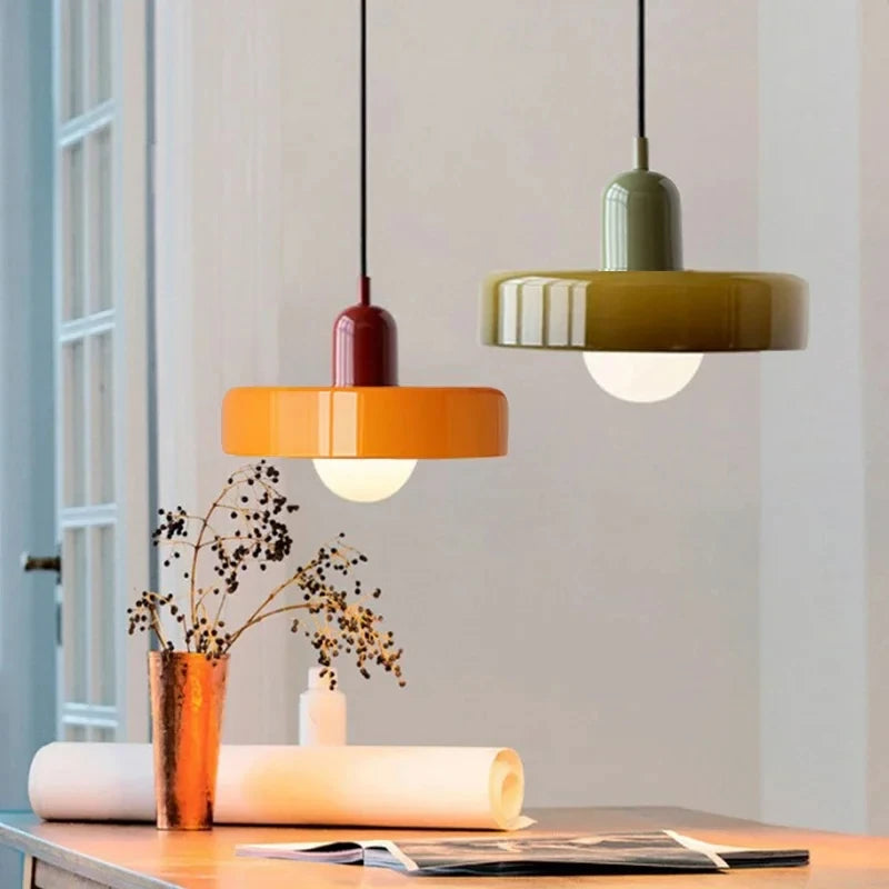 Close view of the coloured glass shade and brass collar