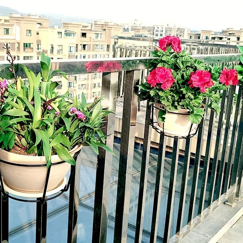 Rail planters planted up on a fence