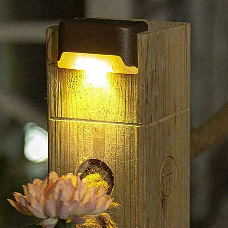 Solar step lights on a deck at dusk