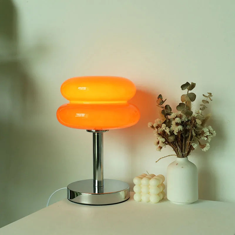 Lamp lit warm in a dim room